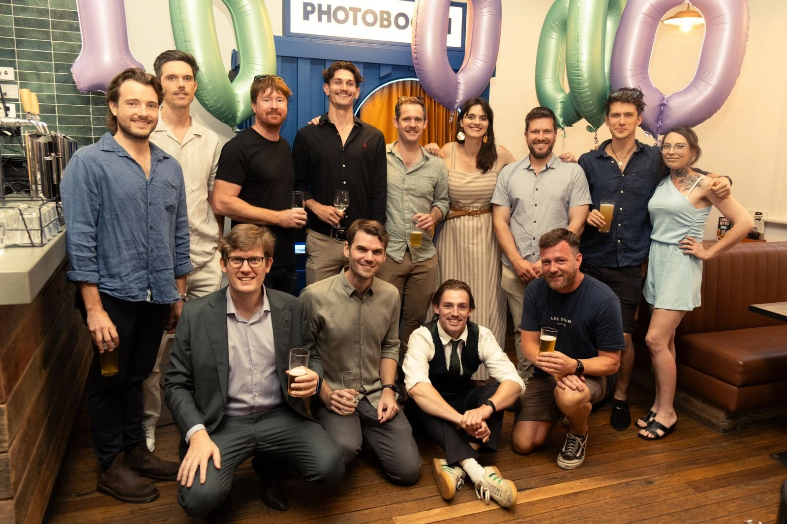 Give Industries team celebrating the one million dollar impact milestone